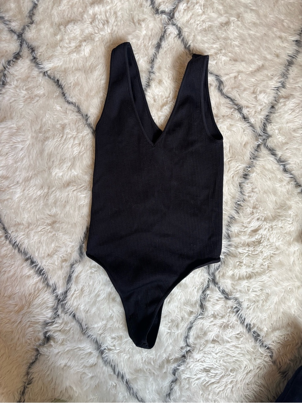Nikibiki Black Ribbed V-Neck Bodysuit